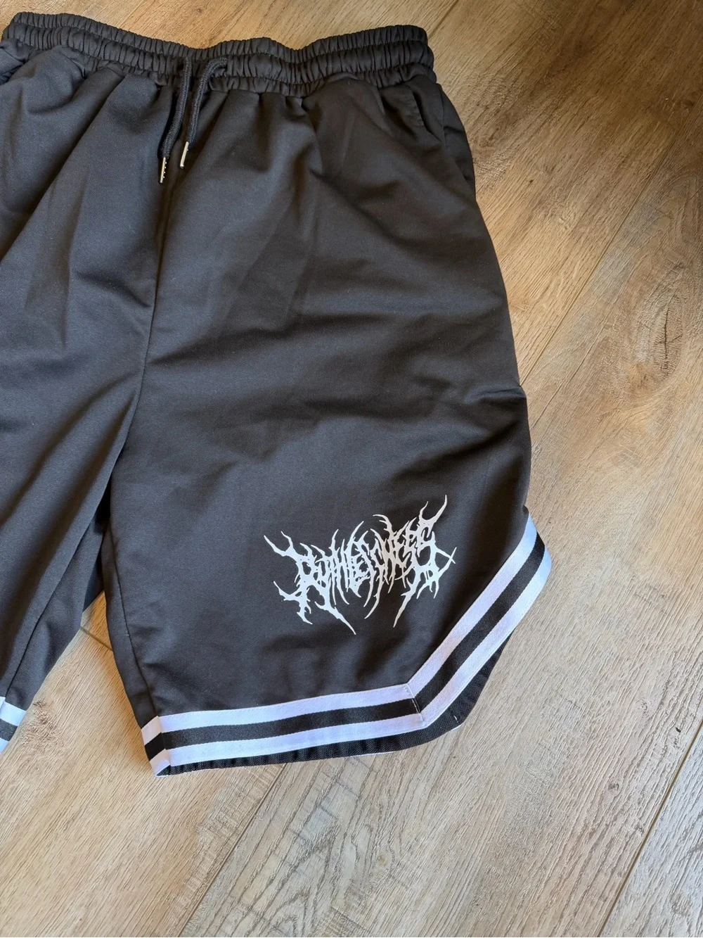 Men's Black Athletic Shorts with Graphic Detail